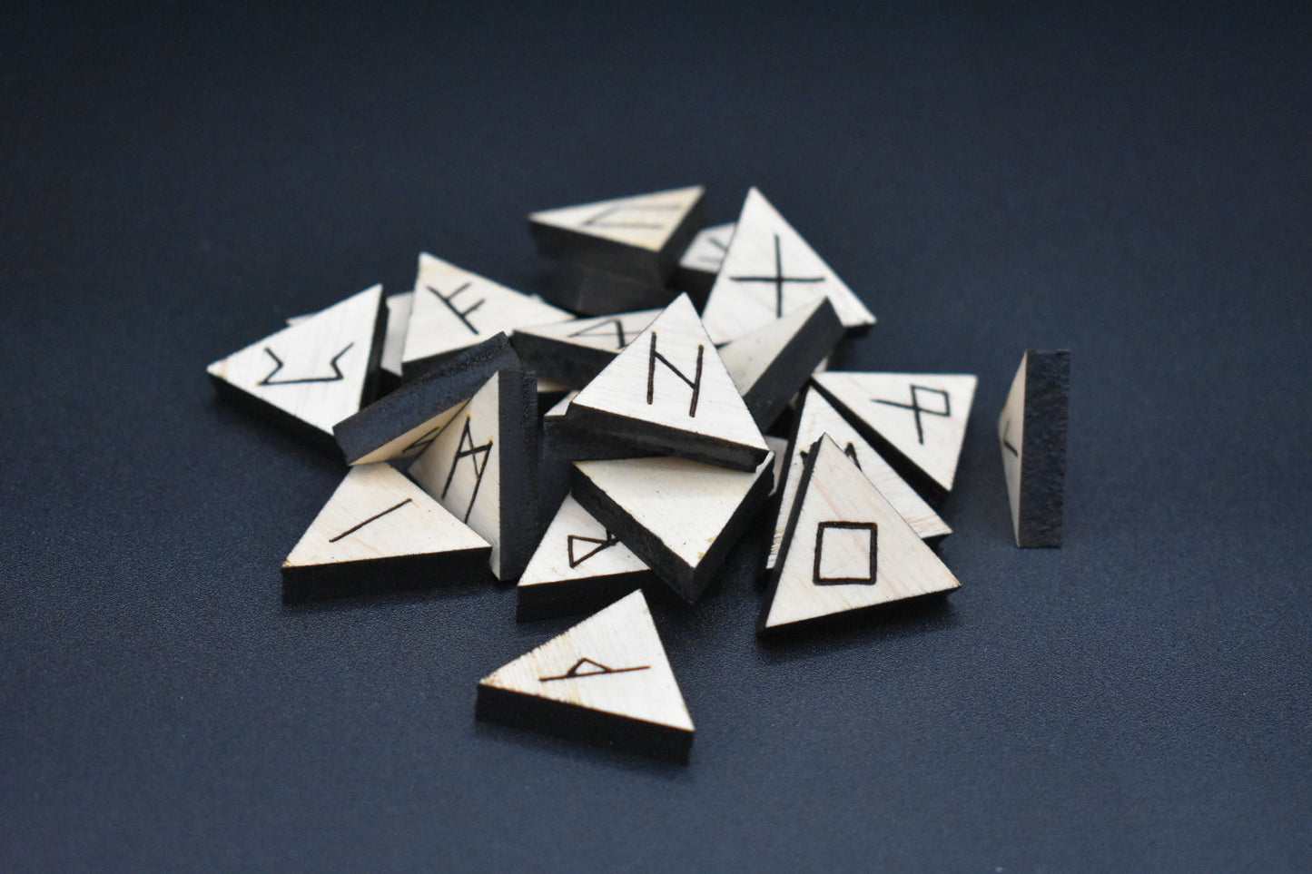 Product photo of laser cut triangle ash runes