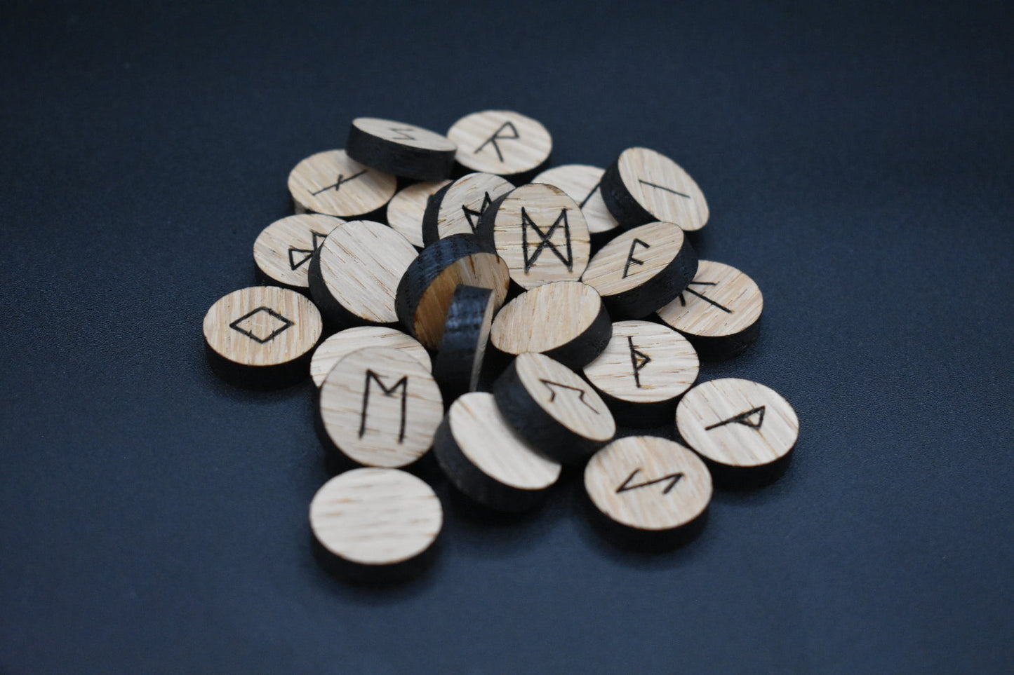 Product photo of laser cut circle oak runes